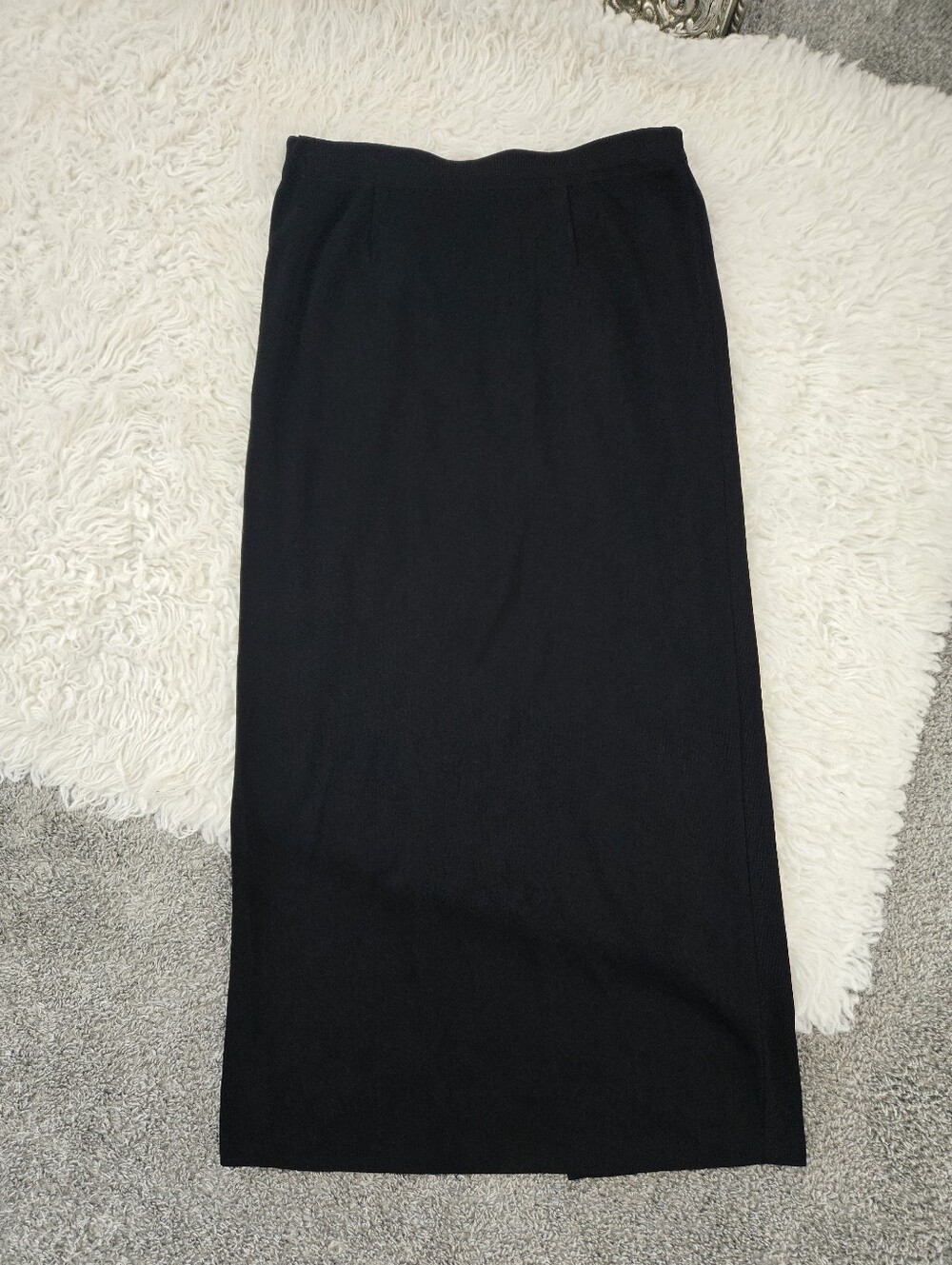 Exclusively Misook Back Slit Straight Knit Skirt in black. Size Large.